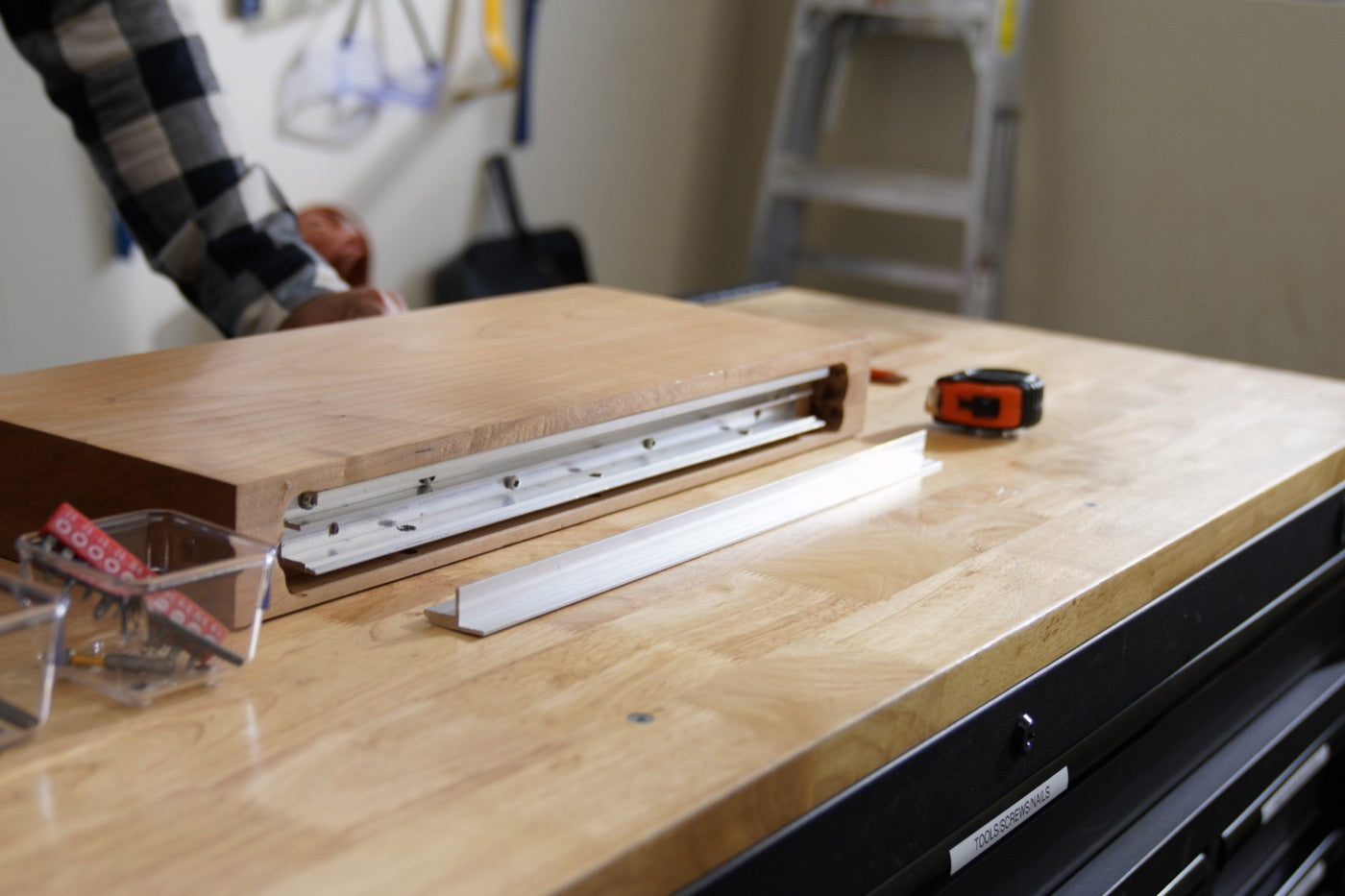 Hovr bracket set into the routed channel in the back of a shelf